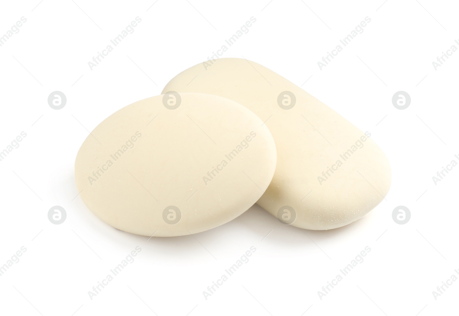 Photo of Two new erasers isolated on white. School stationery