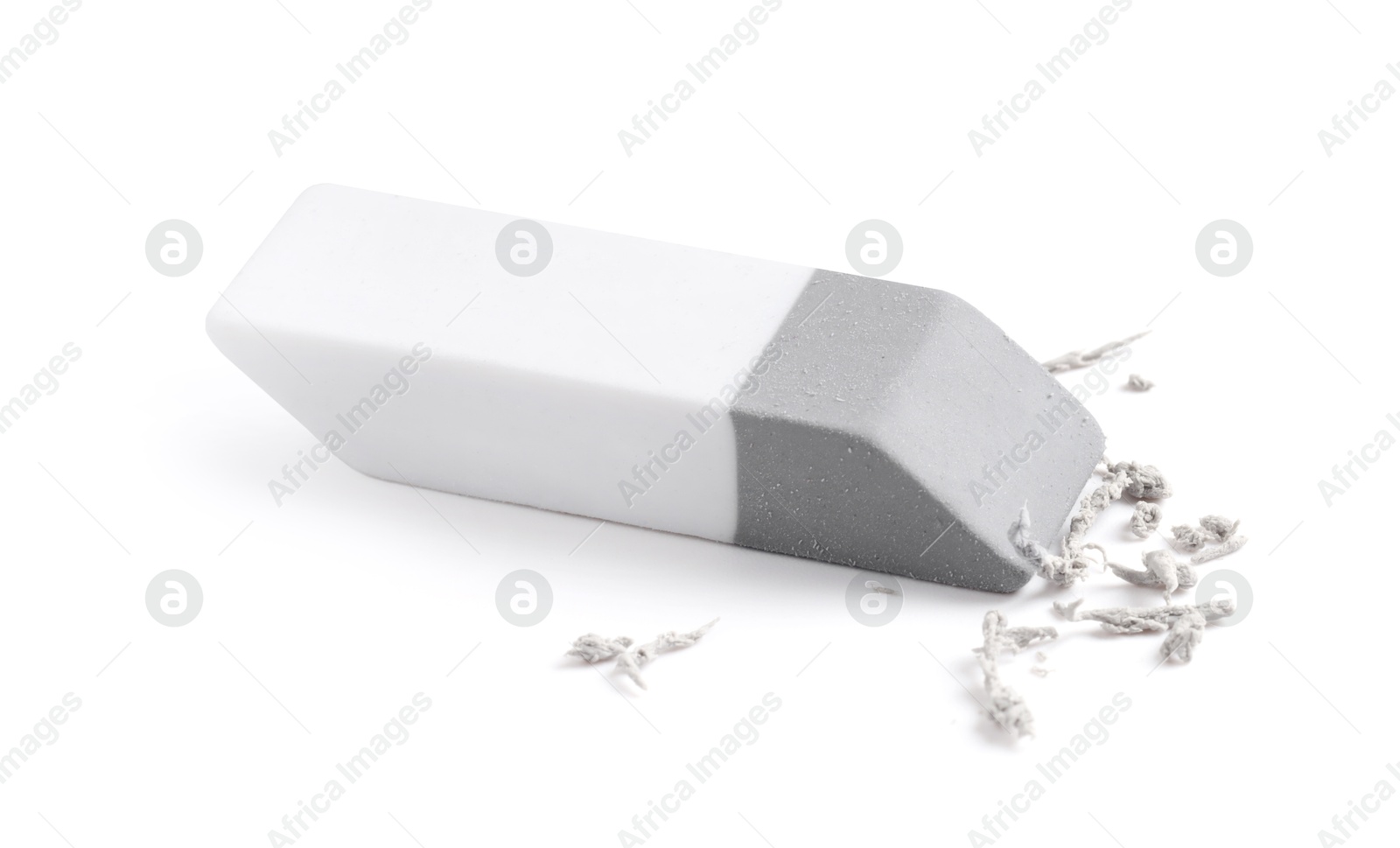 Photo of One eraser and scraps isolated on white