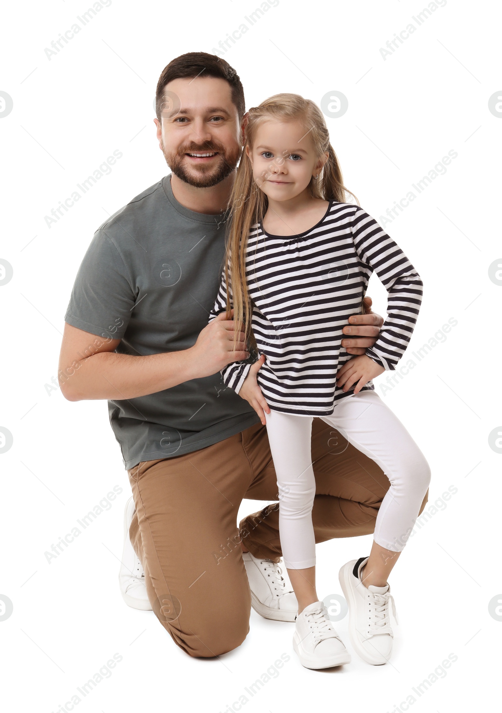 Photo of Happy father and his cute little daughter on white background