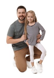 Photo of Happy father and his cute little daughter on white background