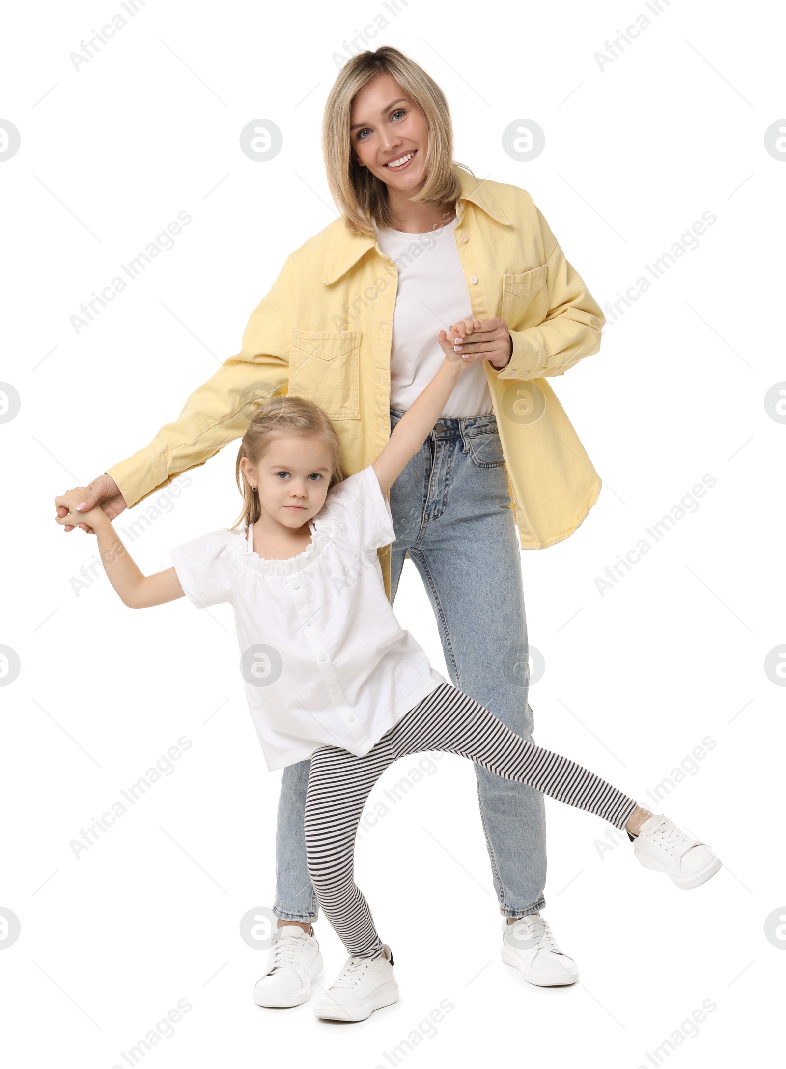 Photo of Happy mother and her cute little daughter on white background