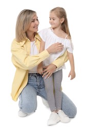 Photo of Happy mother and her cute little daughter on white background