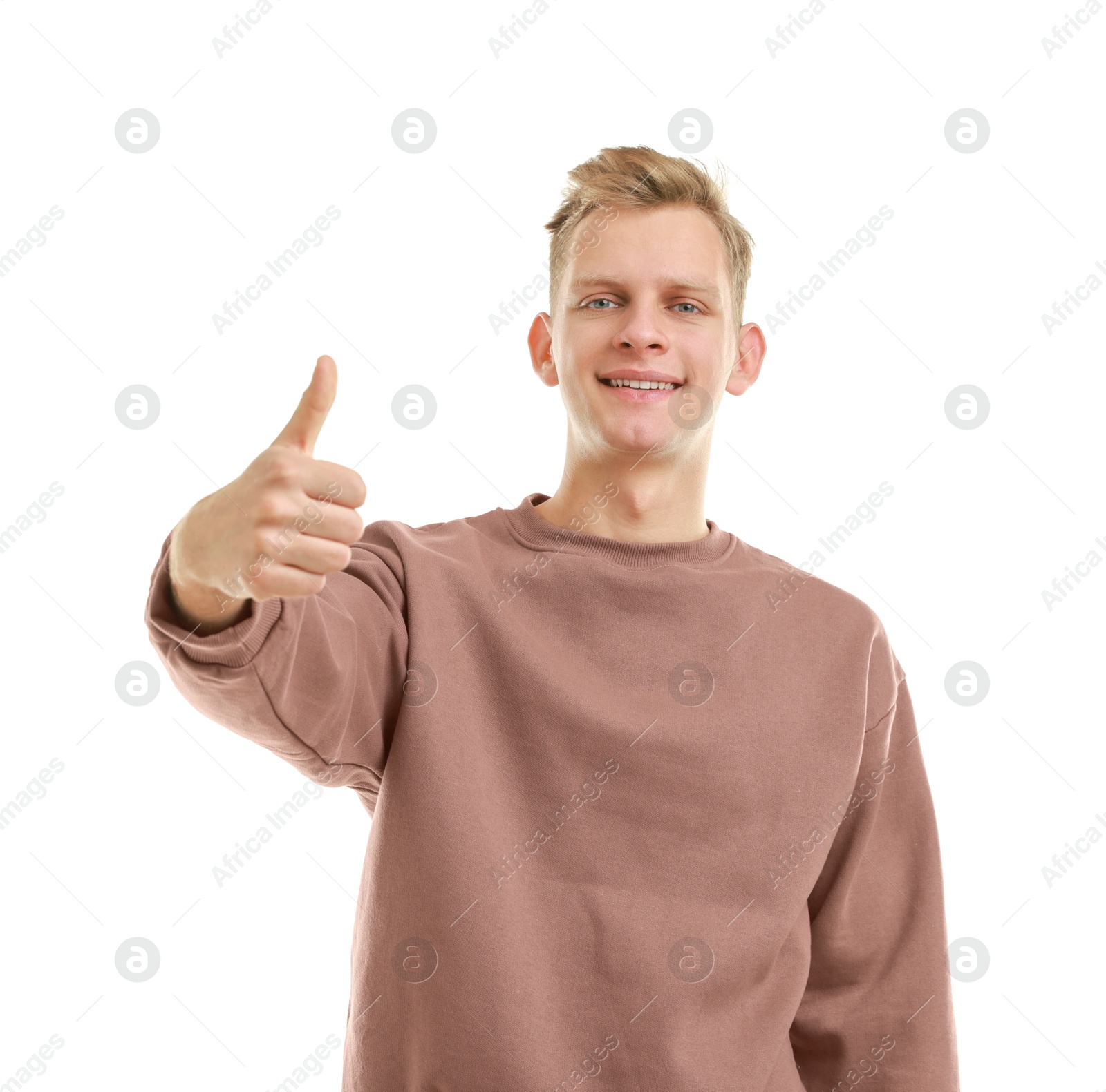 Photo of Happy man showing thumbs up on white background. Like gesture