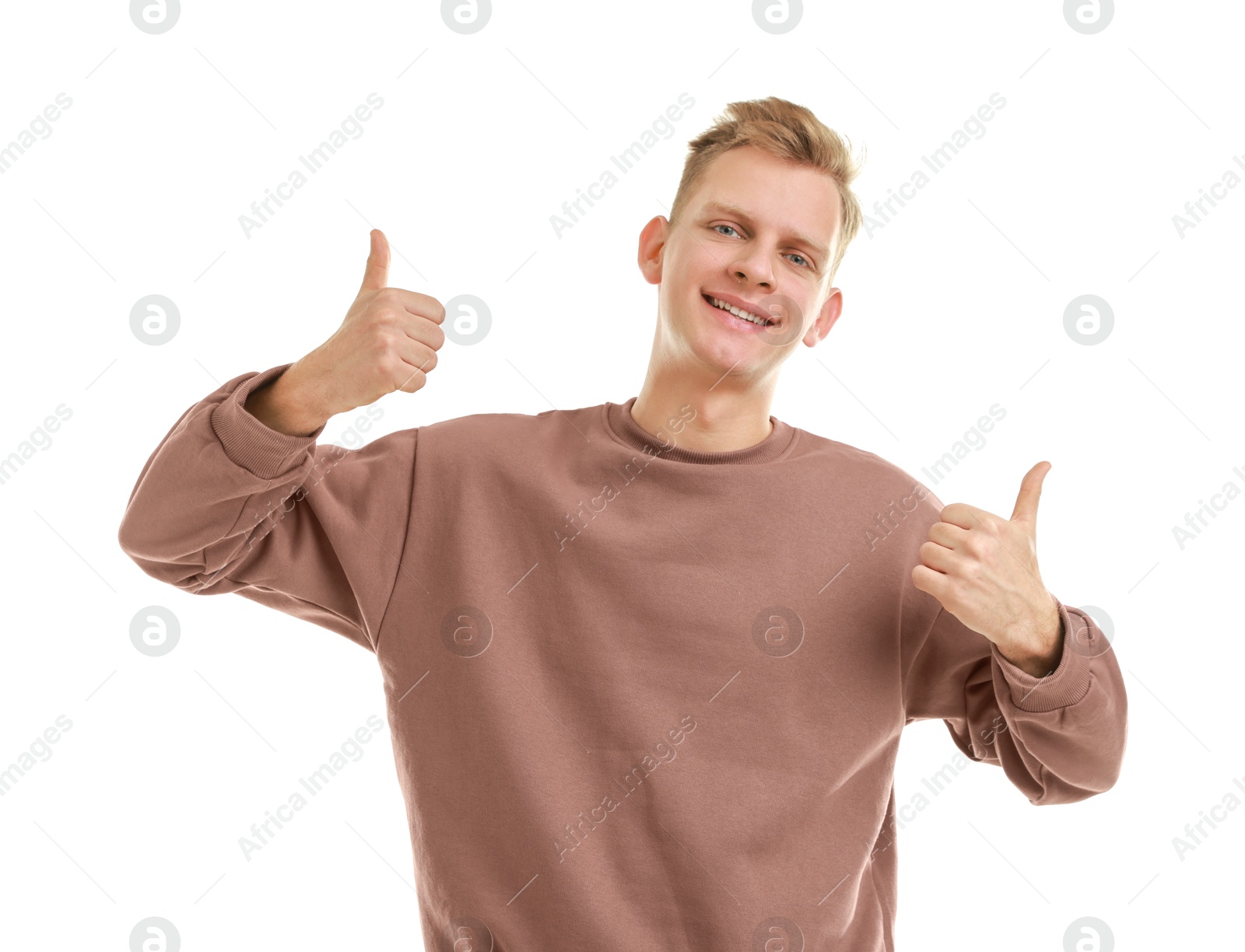 Photo of Happy man showing thumbs up on white background. Like gesture