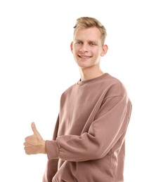 Photo of Happy man showing thumbs up on white background. Like gesture