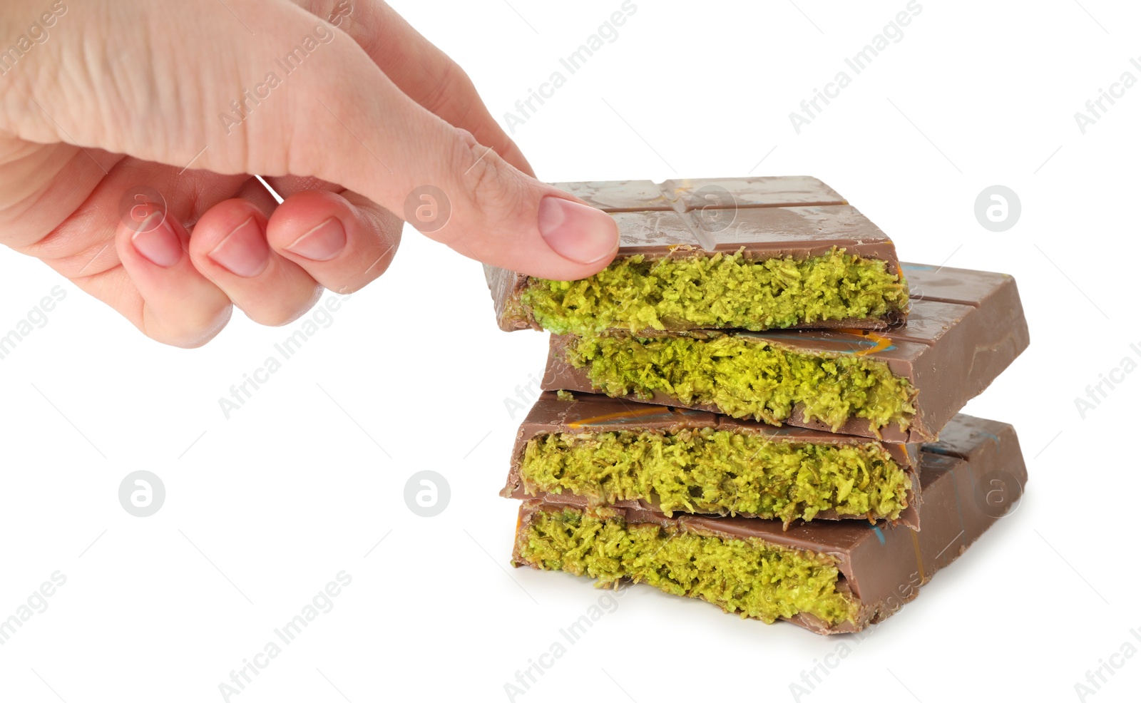 Photo of Woman with pieces of Dubai chocolate on white background, closeup