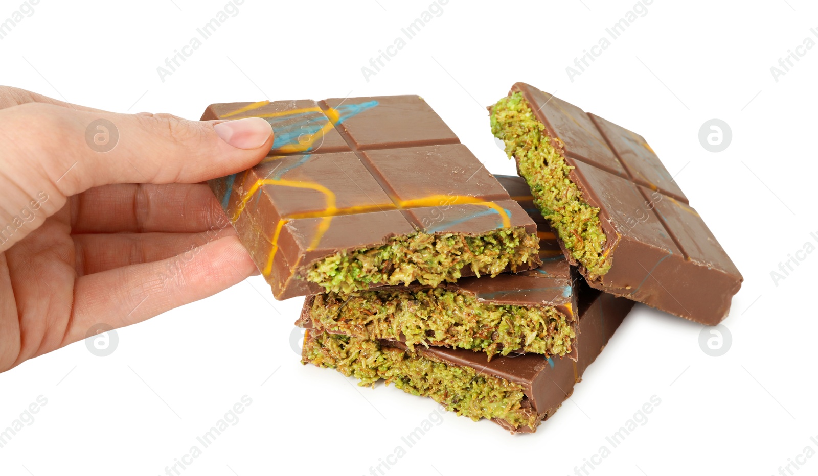 Photo of Woman with pieces of Dubai chocolate on white background, closeup