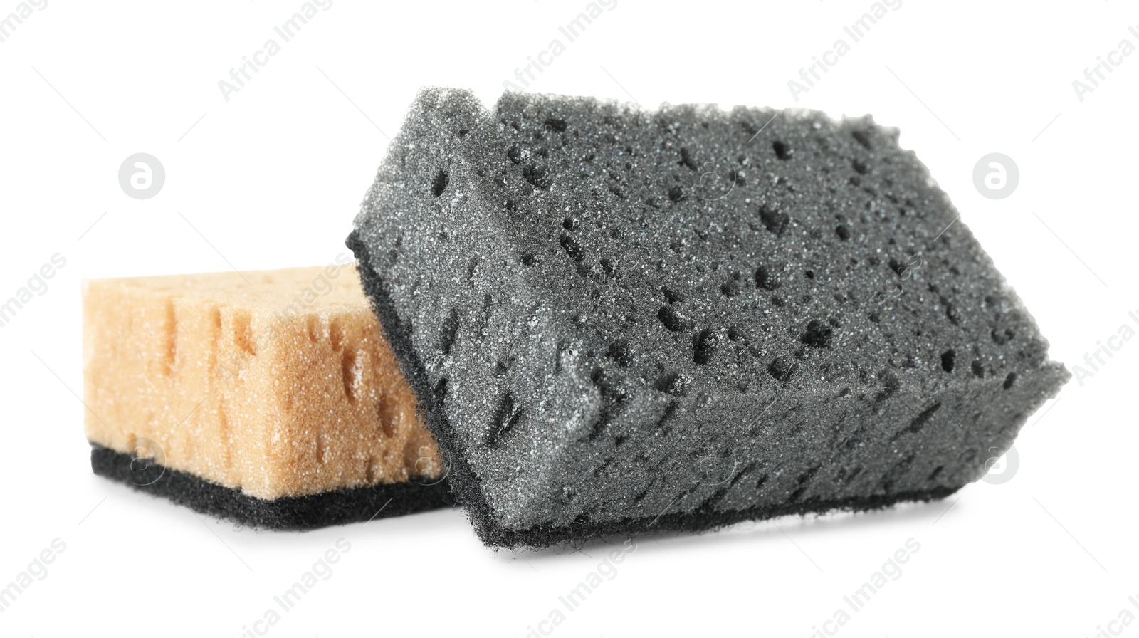 Photo of Two soft sponges isolated on white. Cleaning supply