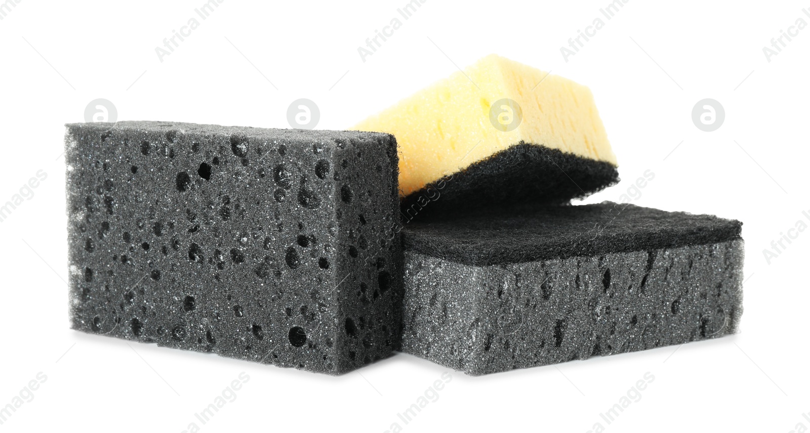 Photo of Different sponges isolated on white. Cleaning supply