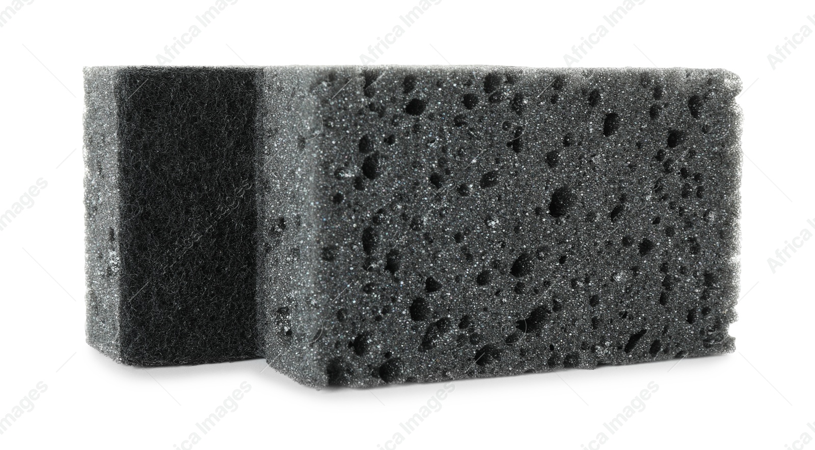 Photo of Two grey sponges isolated on white. Cleaning supply