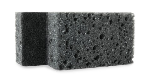 Photo of Two grey sponges isolated on white. Cleaning supply