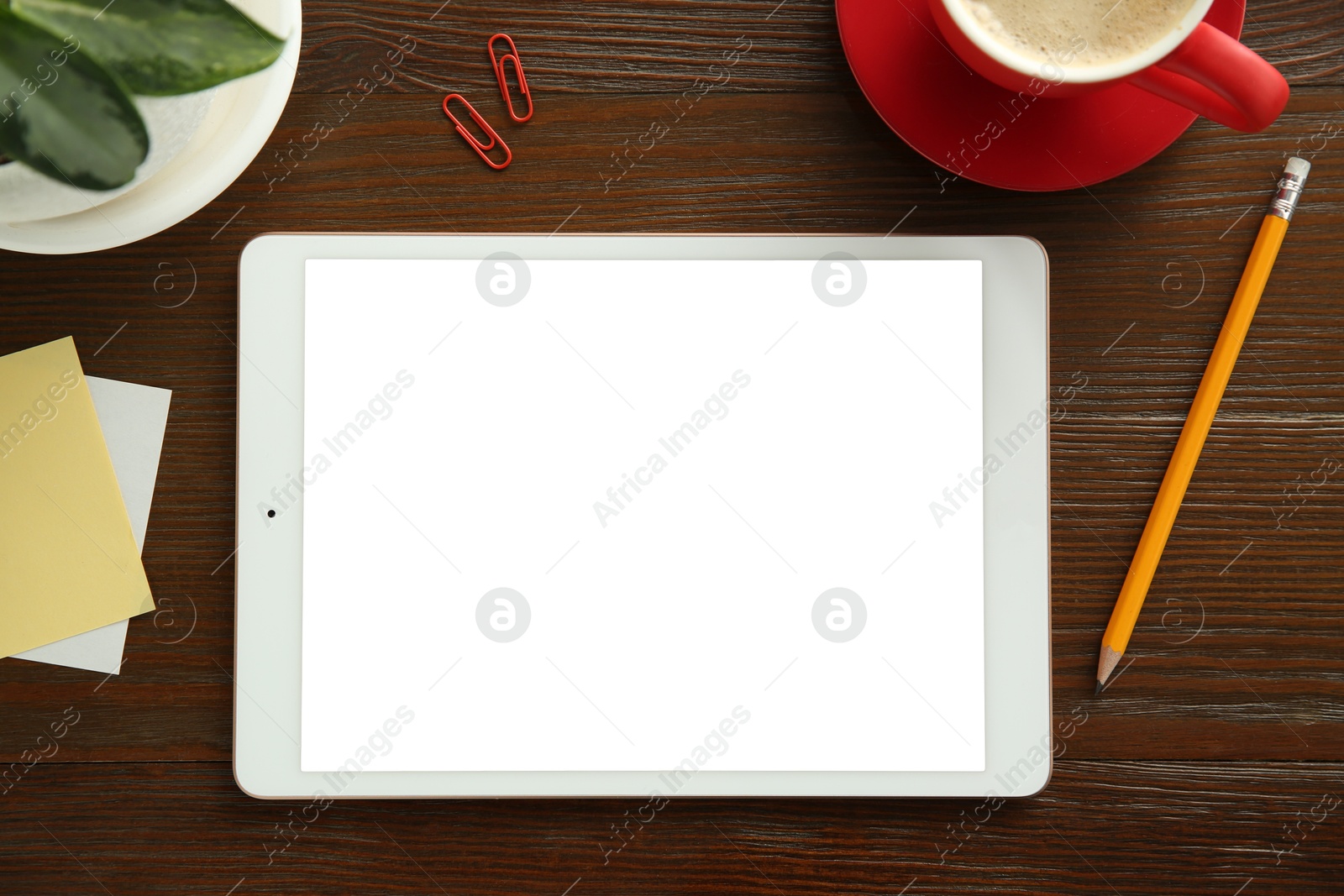 Photo of Flat lay composition with blank tablet on wooden table, space for text