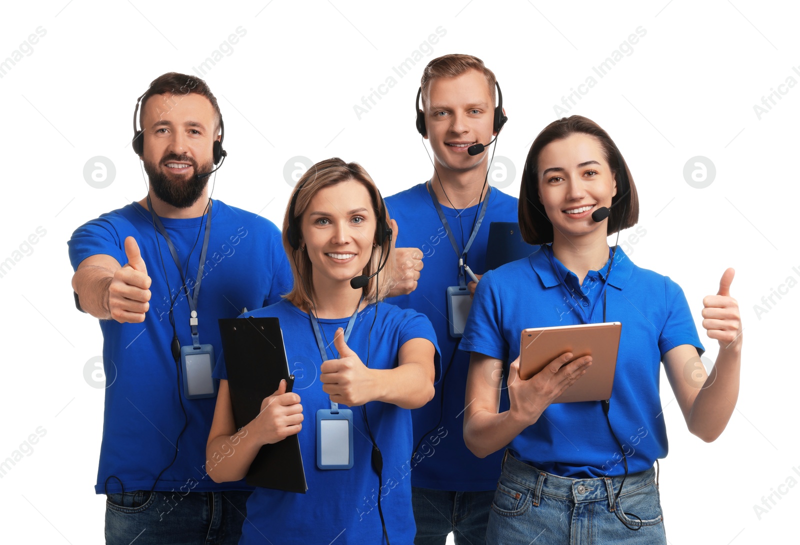 Photo of Technical support call center. Team of friendly operators showing thumbs up on white background