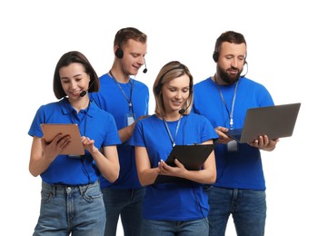 Photo of Technical support call center. Team of friendly operators working on white background