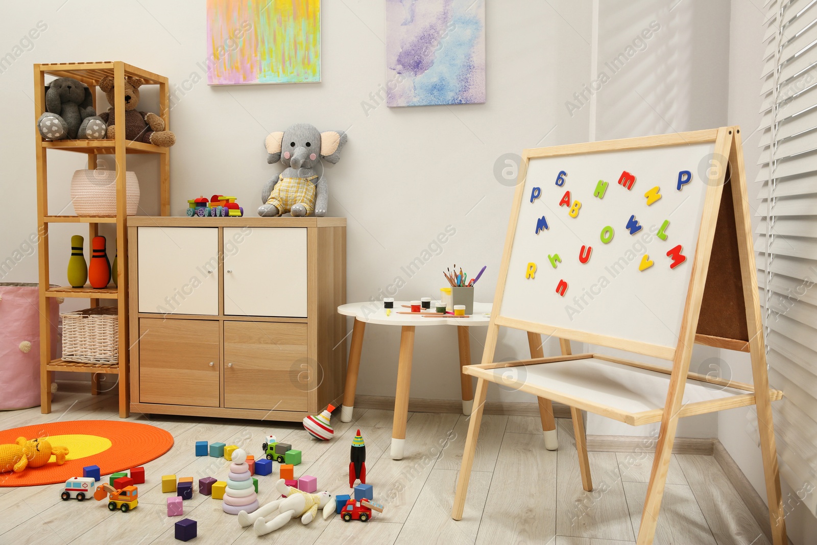 Photo of Child's room interior with many different toys