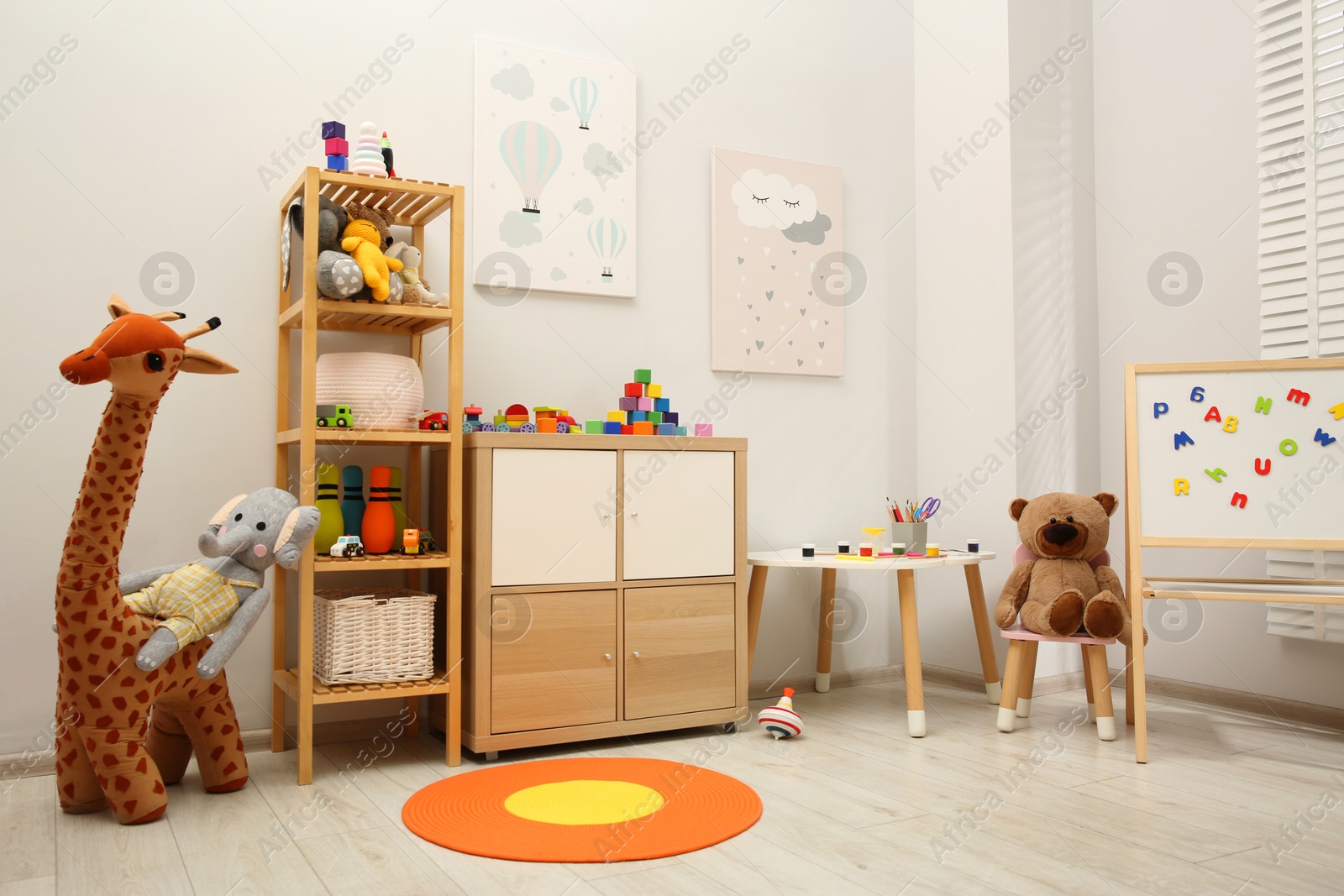 Photo of Child's room interior with many different toys