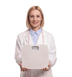 Photo of Weight loss. Happy nutritionist with scales on white background