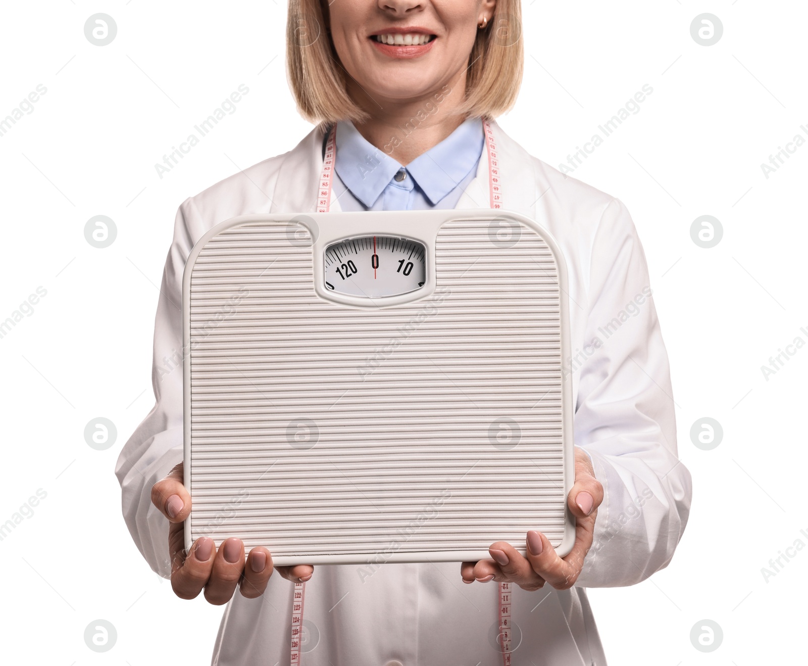 Photo of Weight loss. Happy nutritionist with scales on white background, closeup