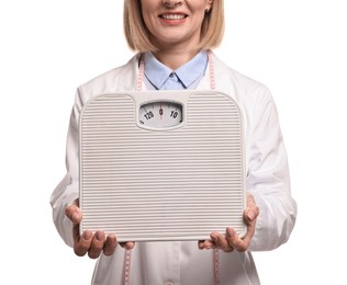 Photo of Weight loss. Happy nutritionist with scales on white background, closeup