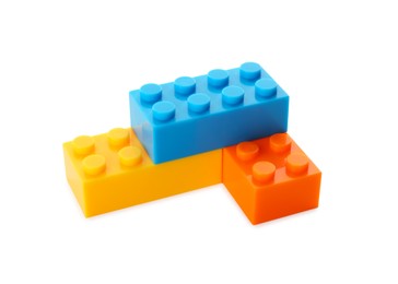 Photo of Construction toy. Figure made with building bricks isolated on white