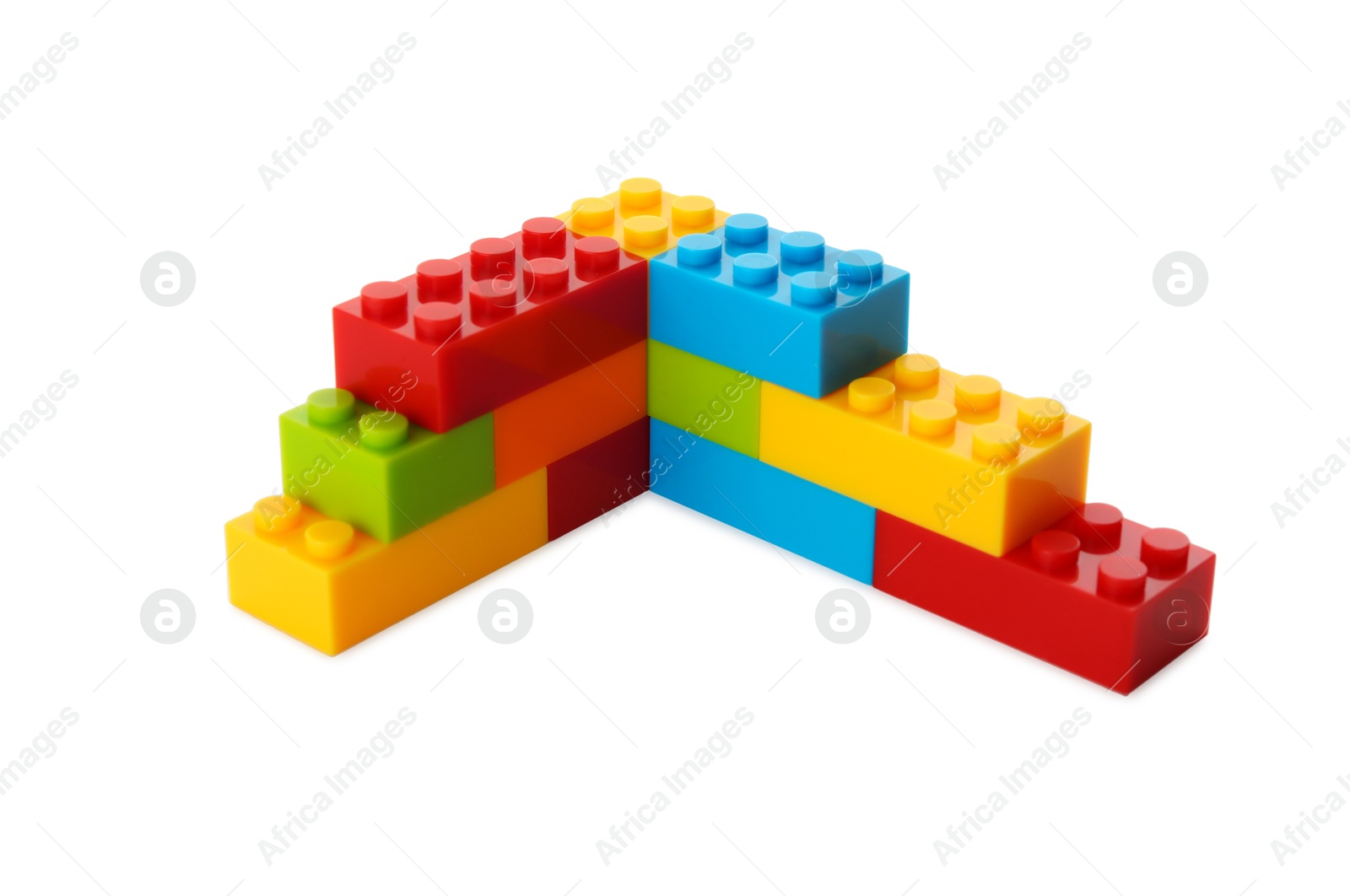 Photo of Construction toy. Figure made with building bricks isolated on white