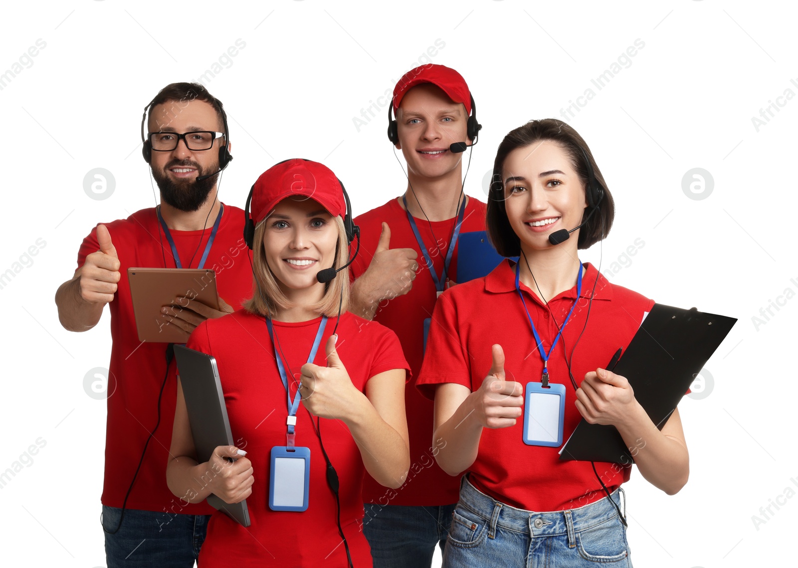 Photo of Technical support call center. Team of friendly operators showing thumbs up on white background