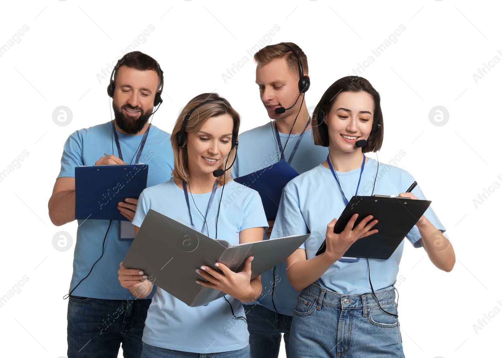 Photo of Technical support call center. Team of friendly operators working on white background