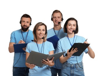 Photo of Technical support call center. Team of friendly operators working on white background