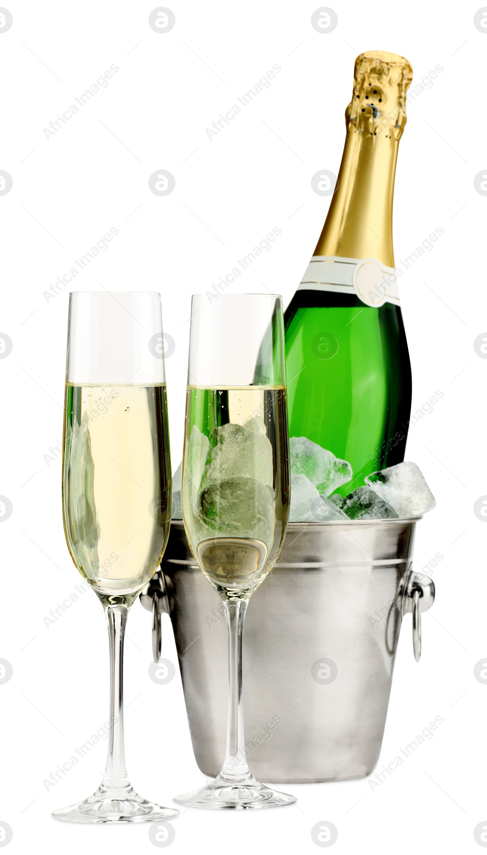 Photo of Champagne in glasses and ice bucket with bottle isolated on white