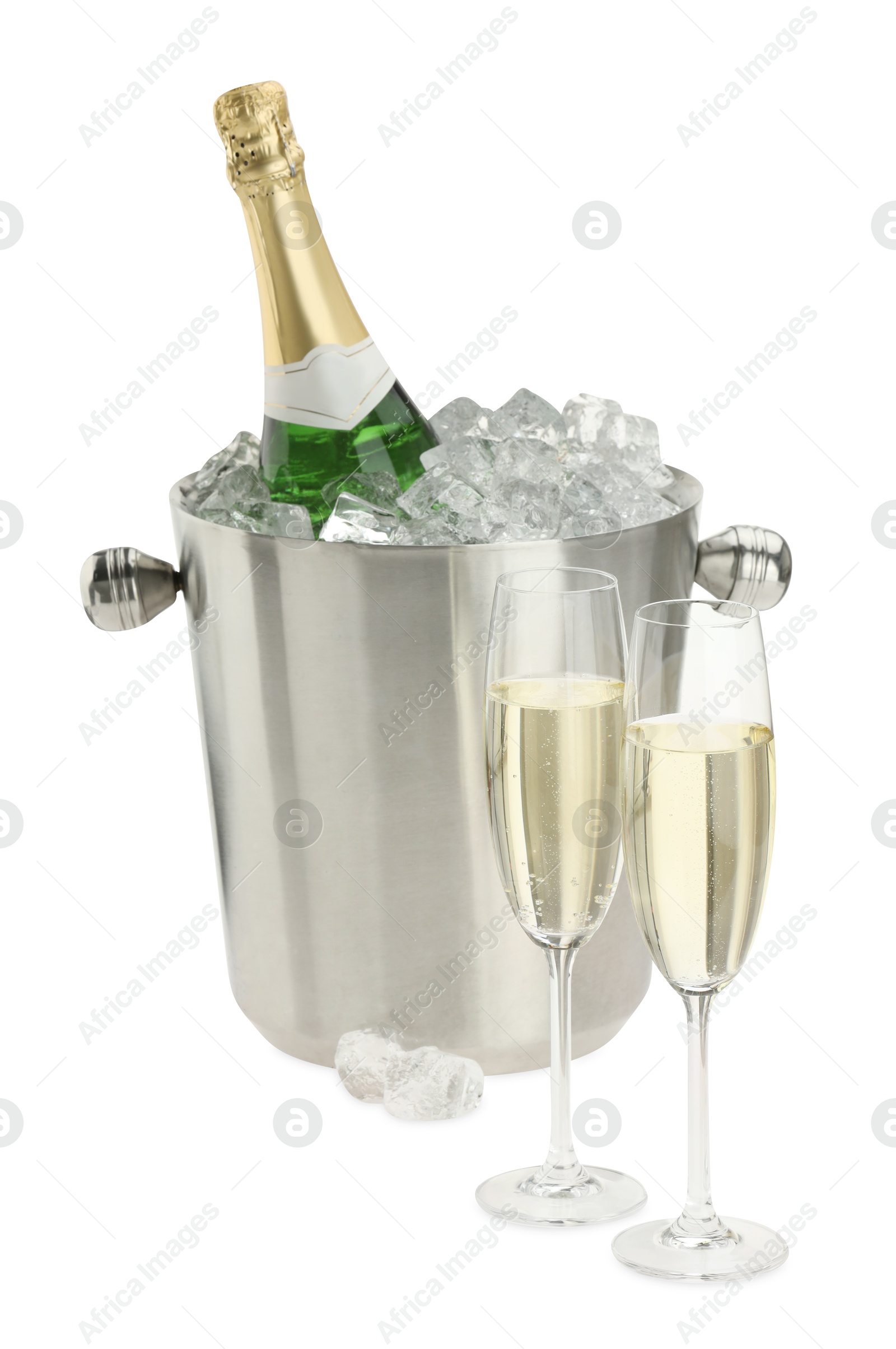 Photo of Champagne in glasses and ice bucket with bottle isolated on white