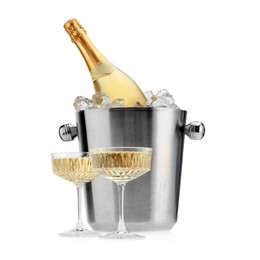 Photo of Champagne in glasses and ice bucket with bottle isolated on white