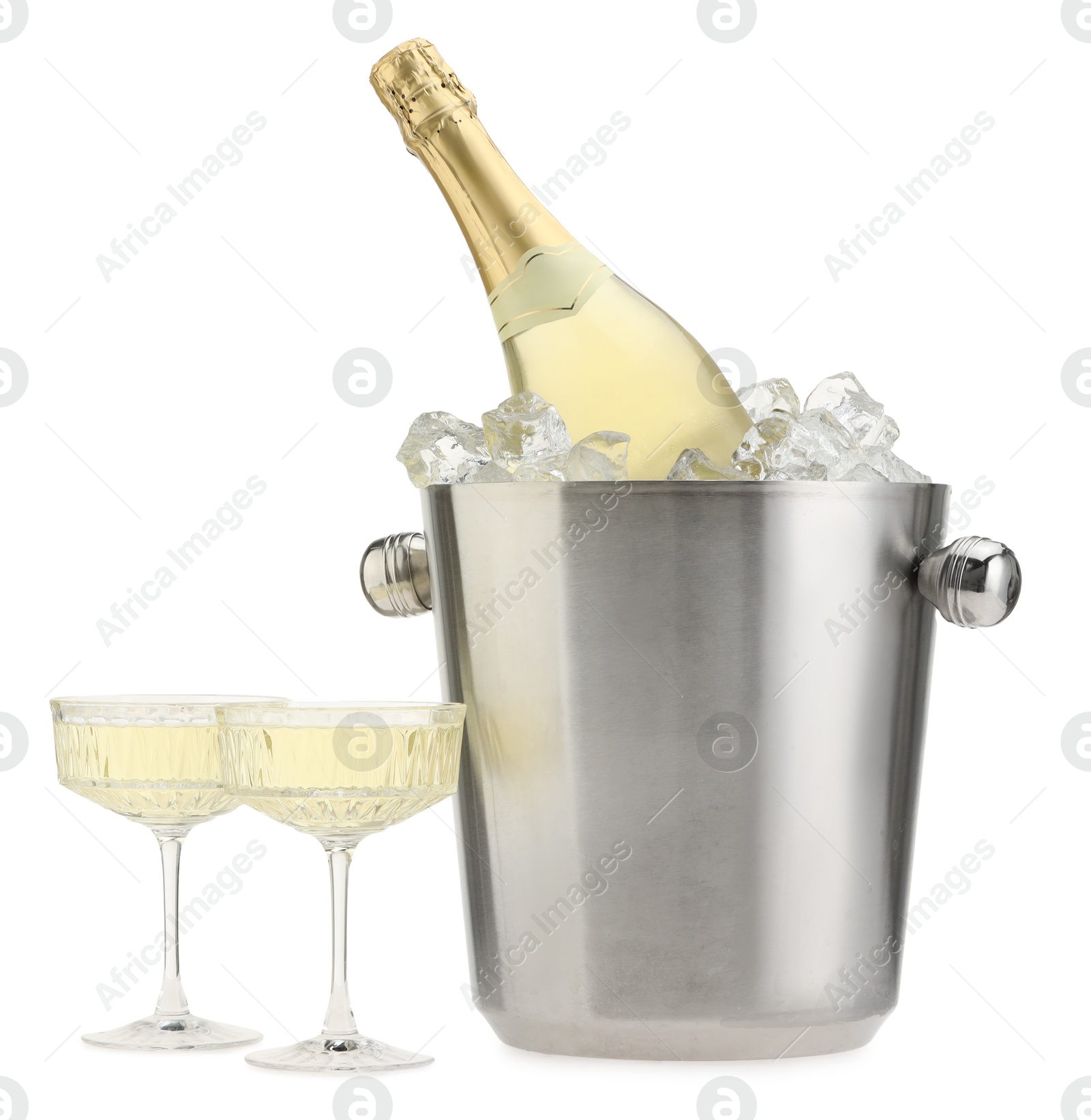 Photo of Champagne in glasses and ice bucket with bottle isolated on white