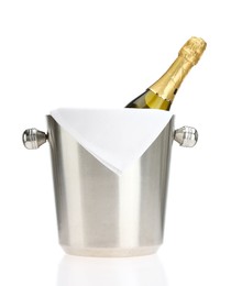 Photo of Bottle of champagne in ice bucket isolated on white