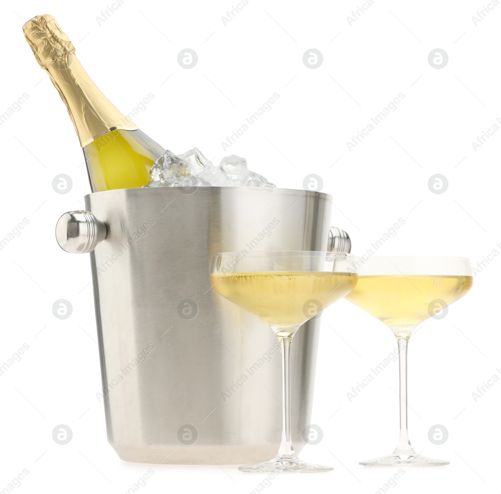 Photo of Champagne in glasses and ice bucket with bottle isolated on white