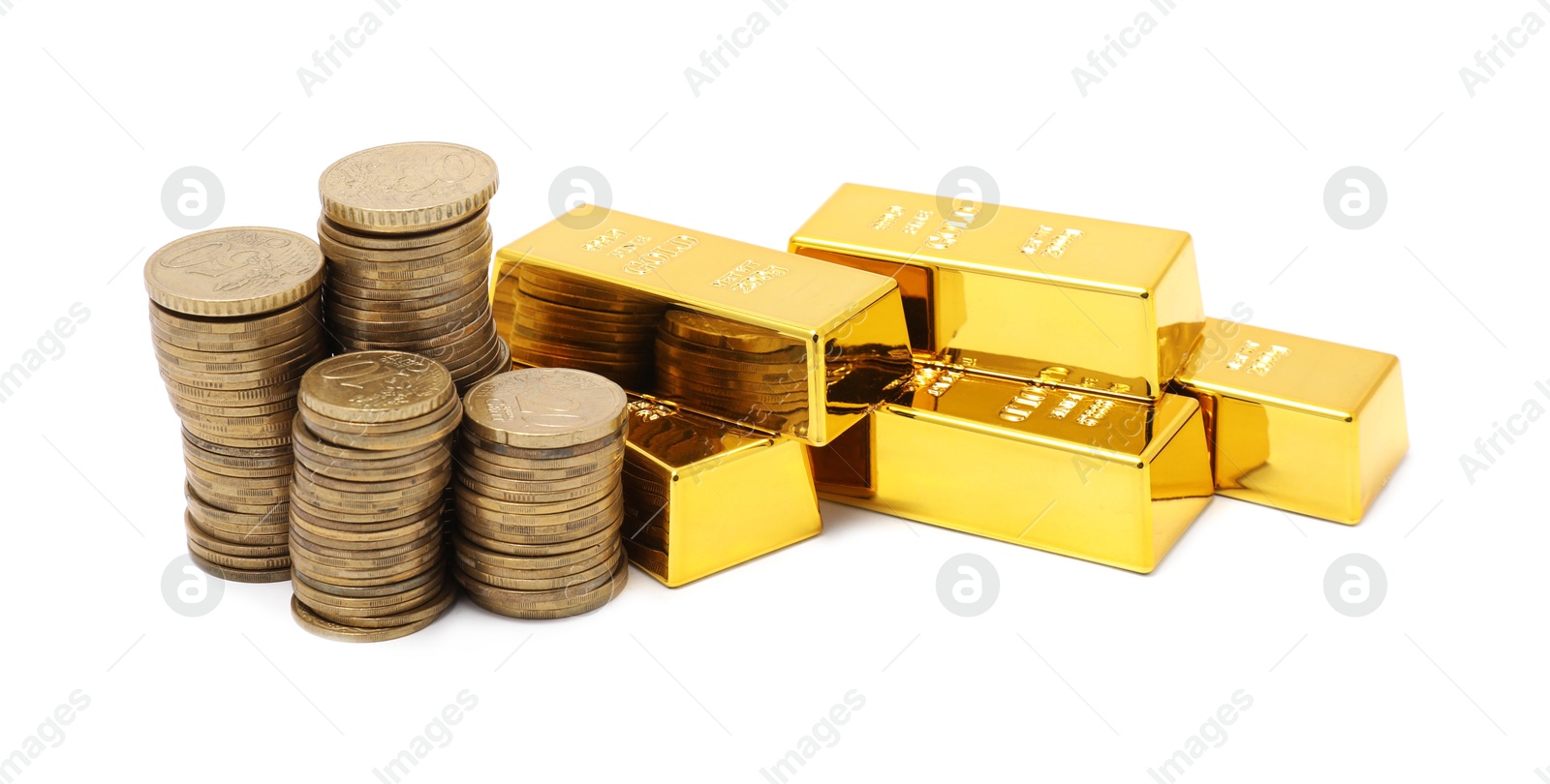 Photo of Gold bars and coins isolated on white