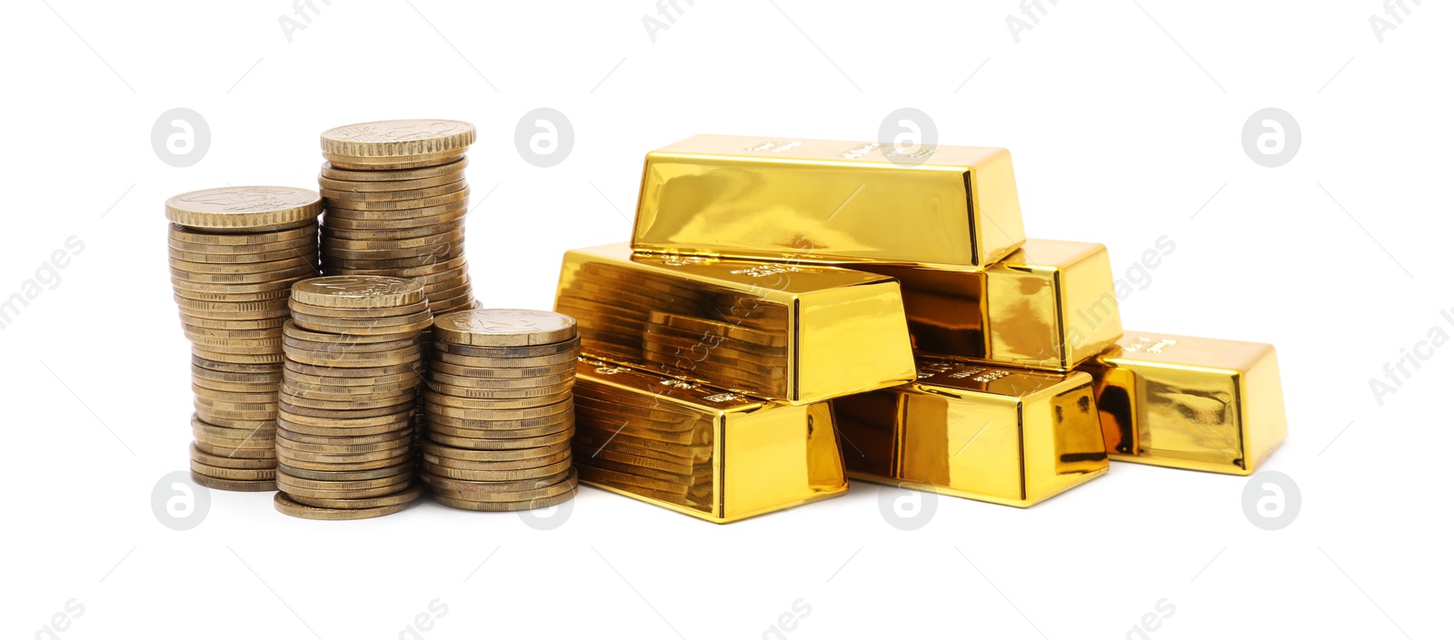 Photo of Gold bars and coins isolated on white