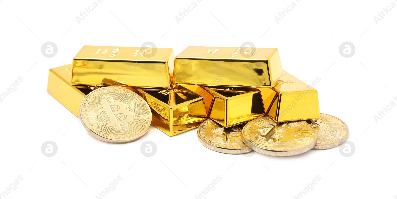 Photo of Gold bars and coins isolated on white