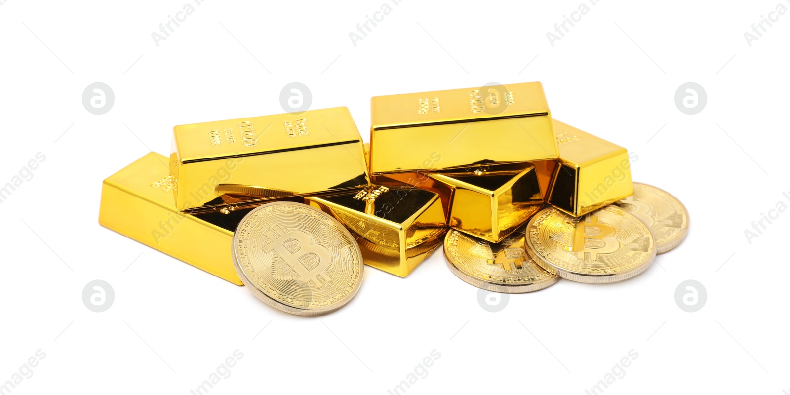 Photo of Gold bars and coins isolated on white