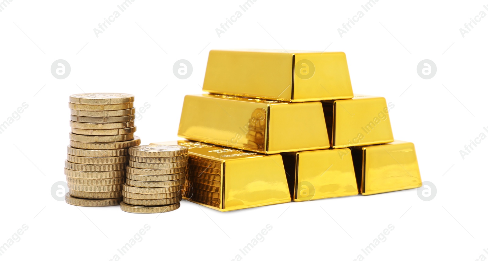 Photo of Gold bars and coins isolated on white