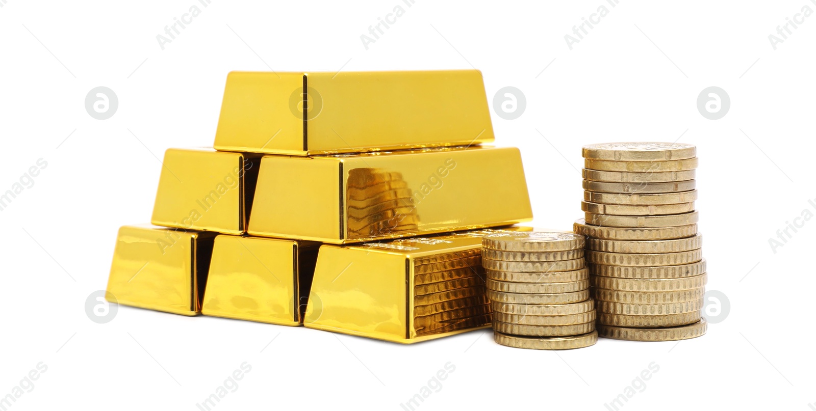 Photo of Gold bars and coins isolated on white