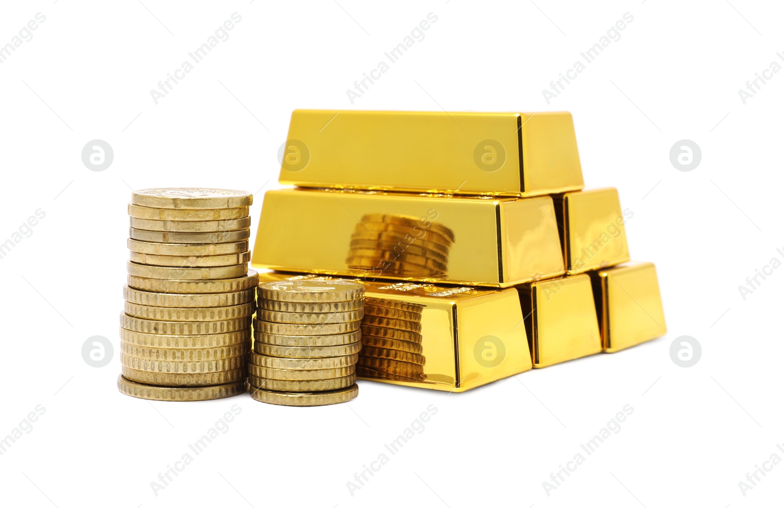 Photo of Gold bars and coins isolated on white