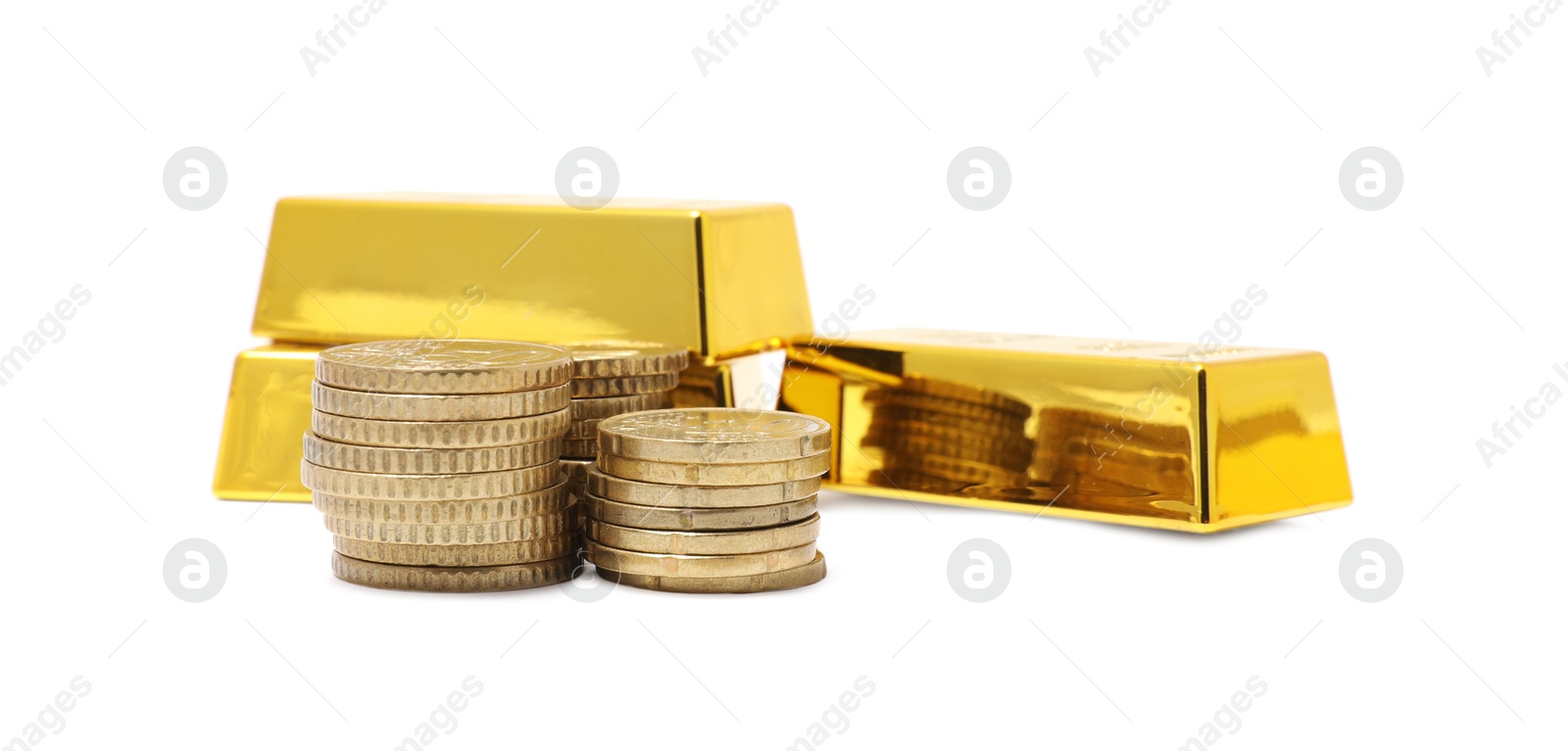 Photo of Gold bars and coins isolated on white