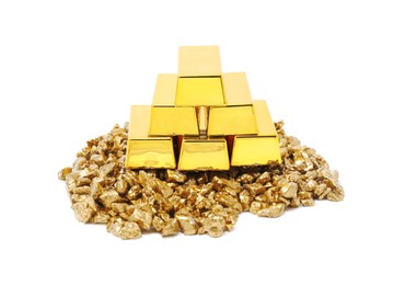 Photo of Gold nuggets and bars isolated on white