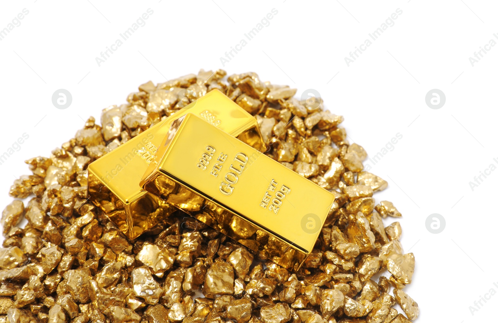 Photo of Gold nuggets and bars isolated on white