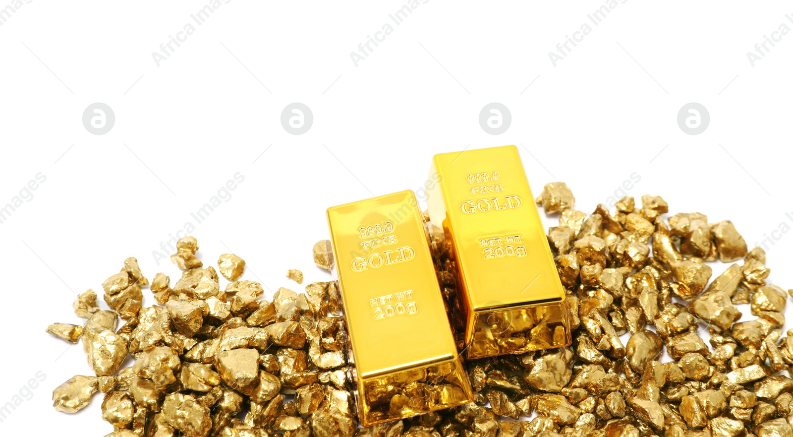 Photo of Gold nuggets and bars isolated on white