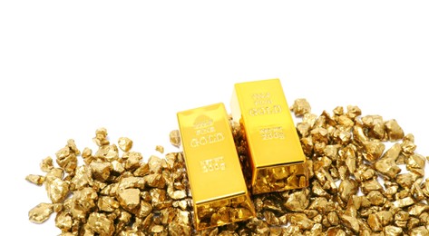 Photo of Gold nuggets and bars isolated on white