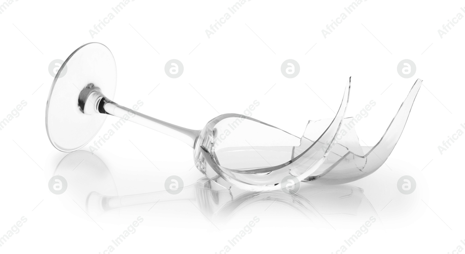 Photo of Pieces of broken wine glass isolated on white