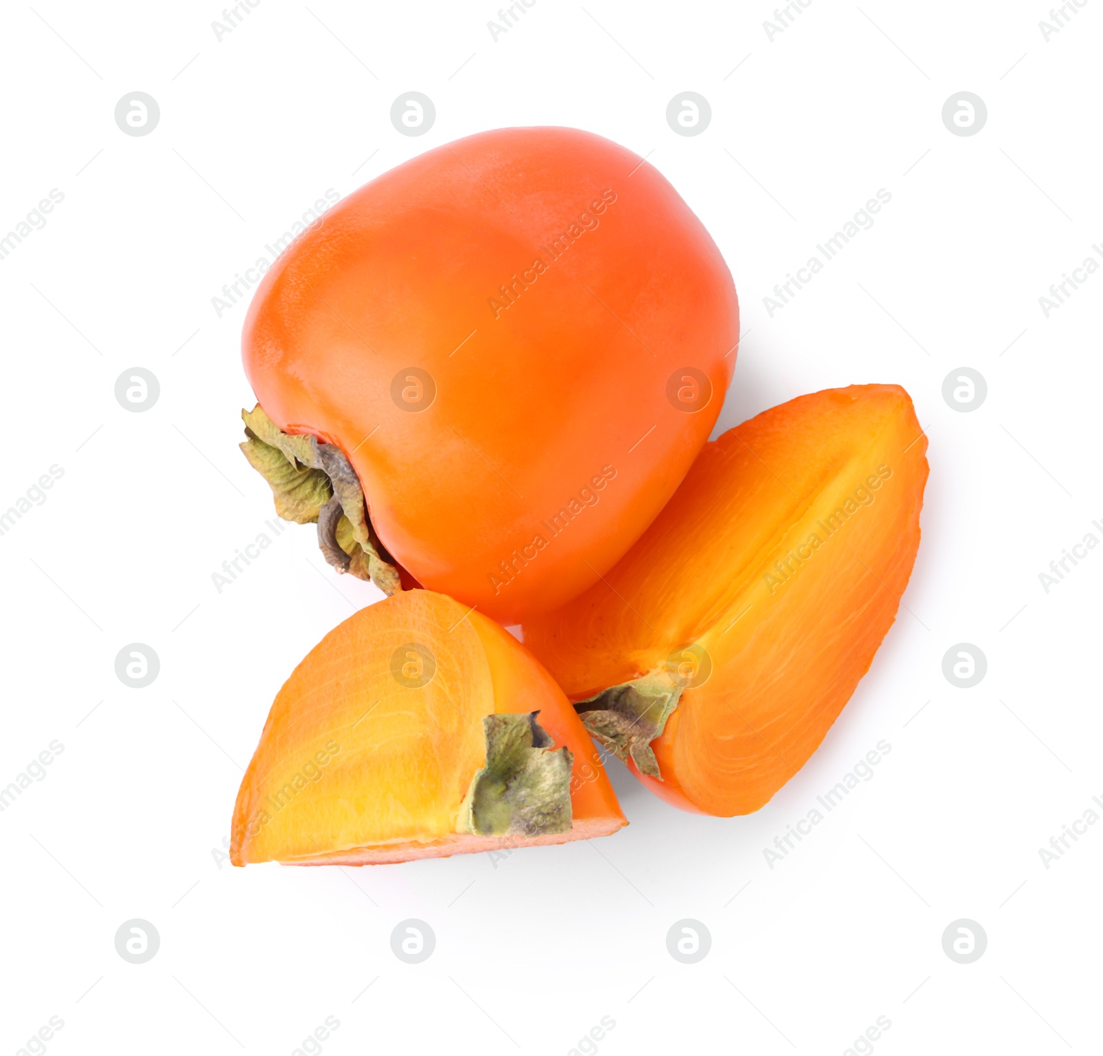 Photo of Whole and cut ripe persimmons isolated on white, top view