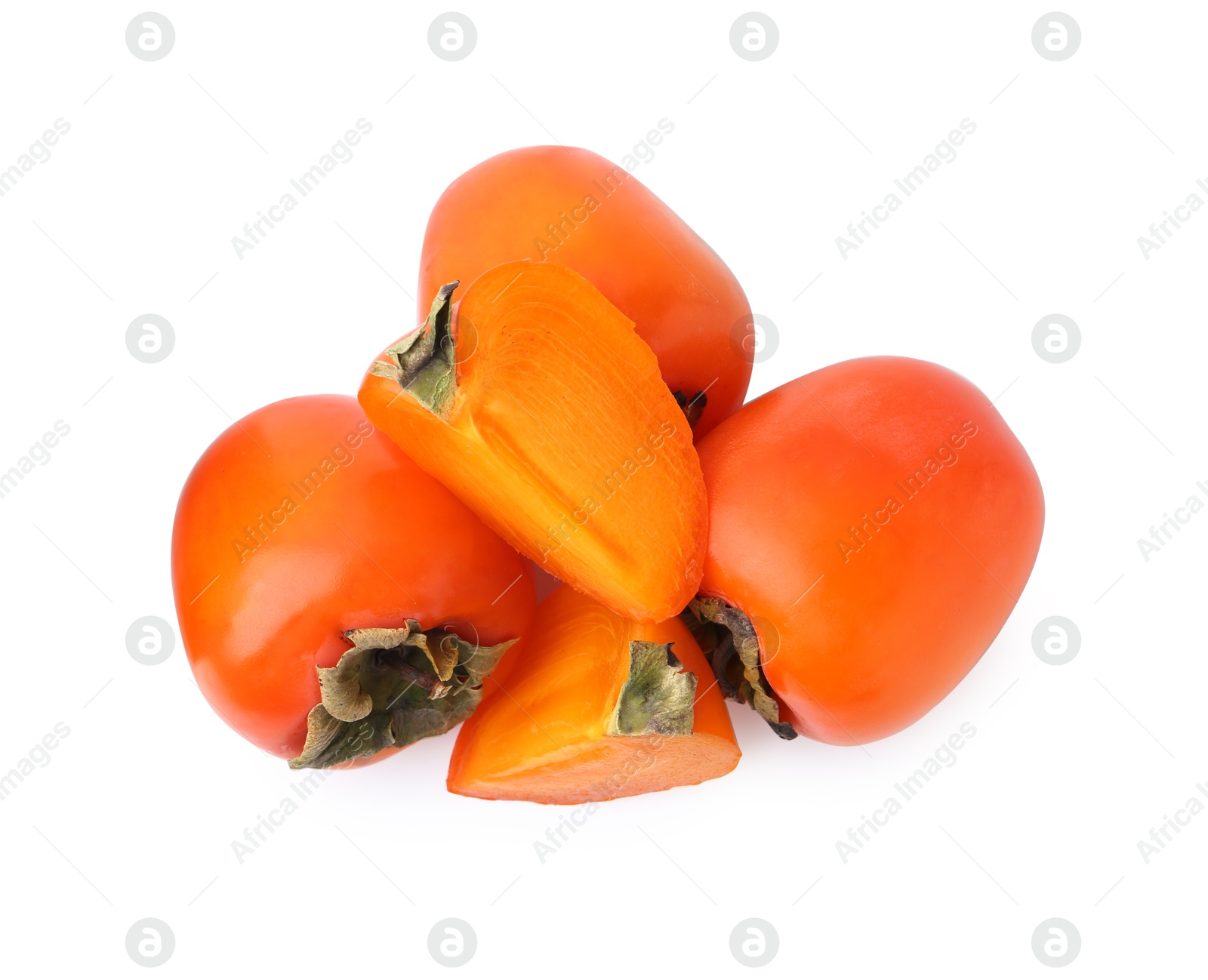 Photo of Whole and cut ripe persimmons isolated on white, top view