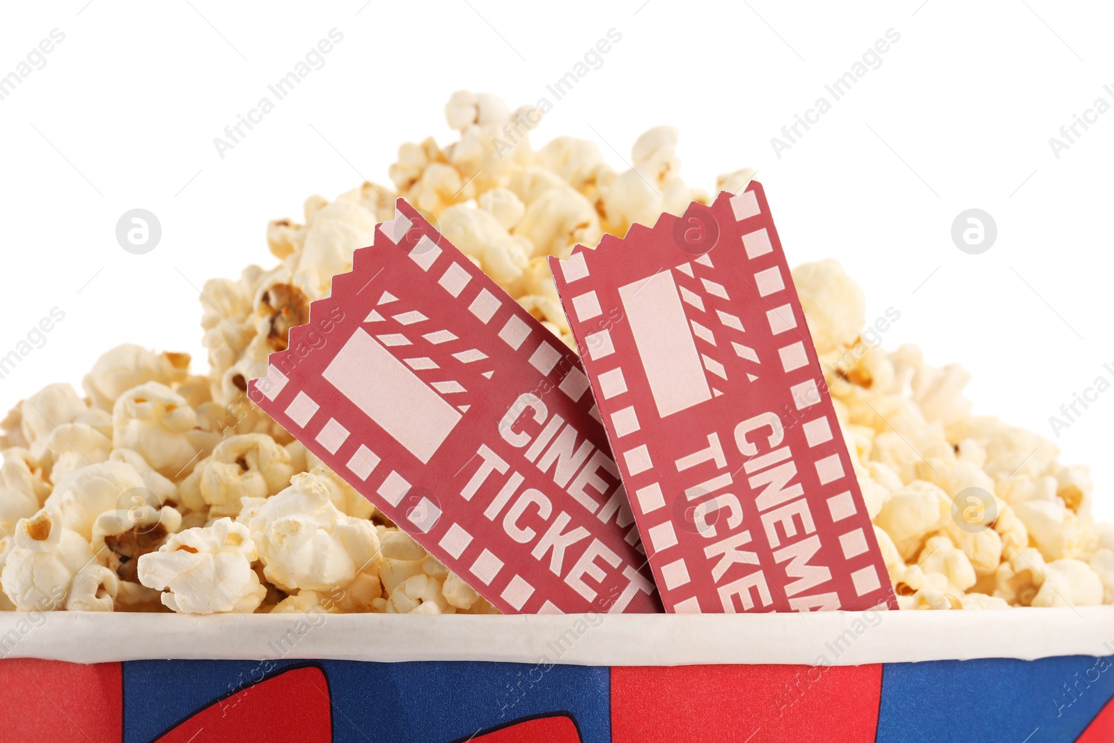 Photo of Tasty popcorn and movie tickets isolated on white